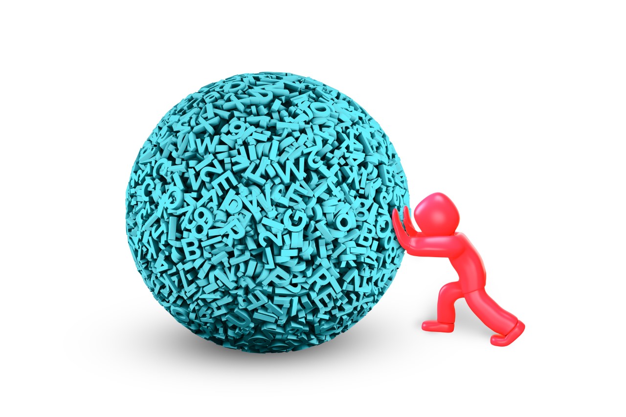 Man pushing globe of text and numbers